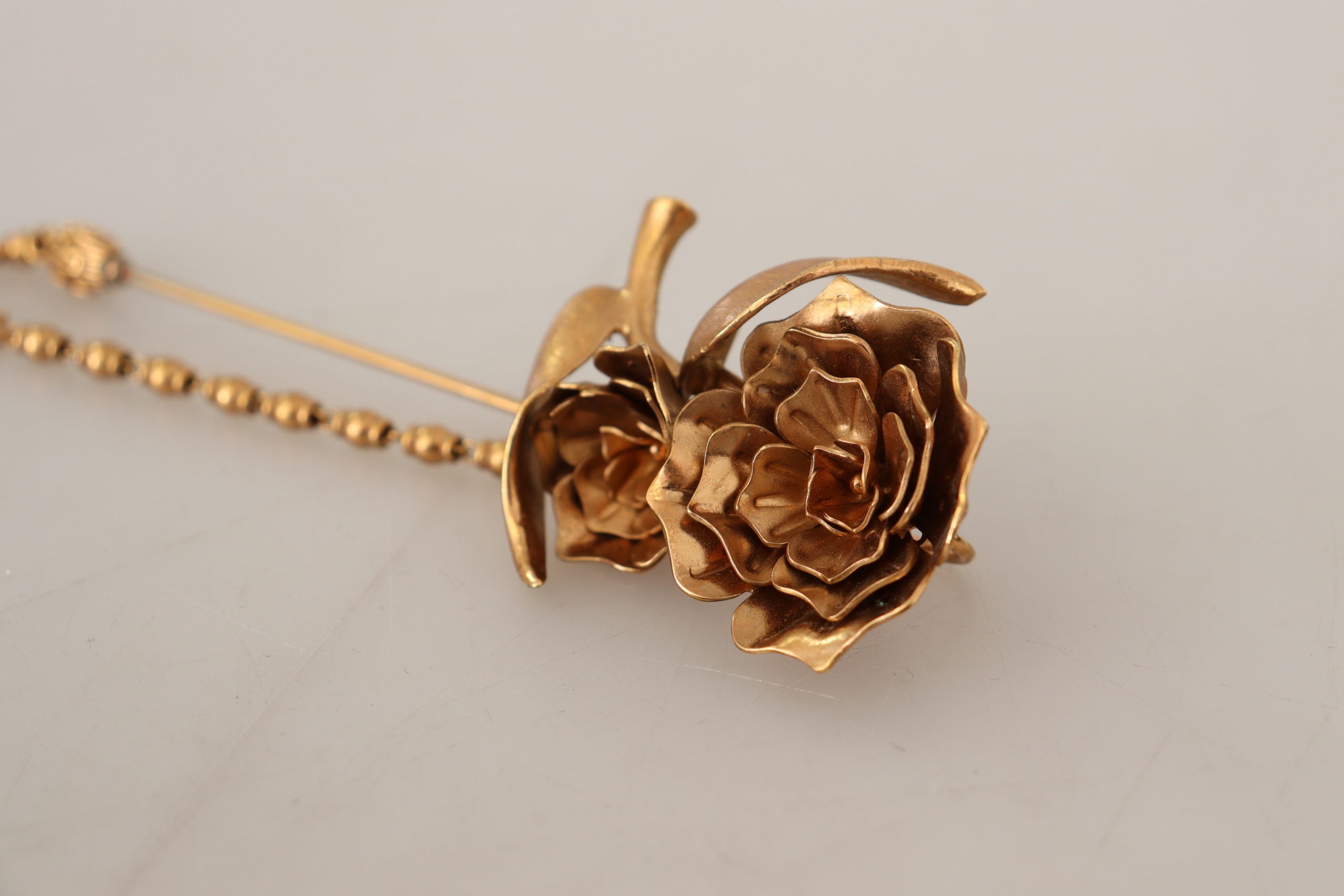 Dolce & Gabbana Elegant Gold Tone Brass Brooch Pin