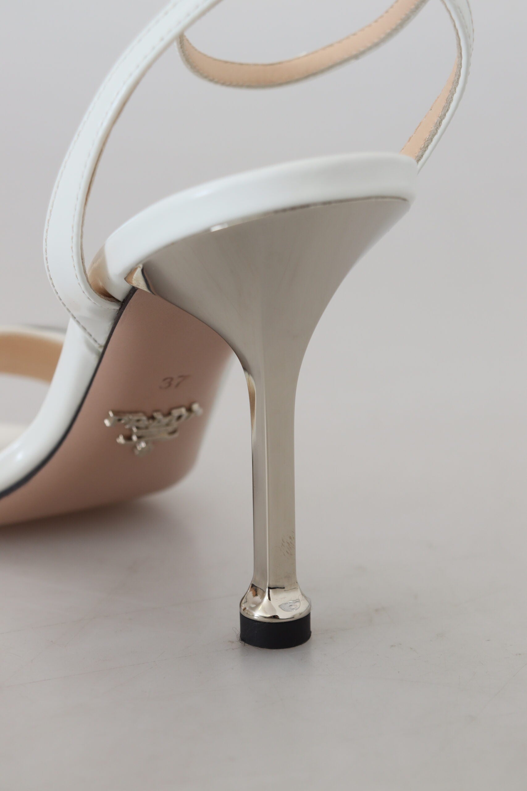 Prada Elegant Silver-White Leather Strap Heels