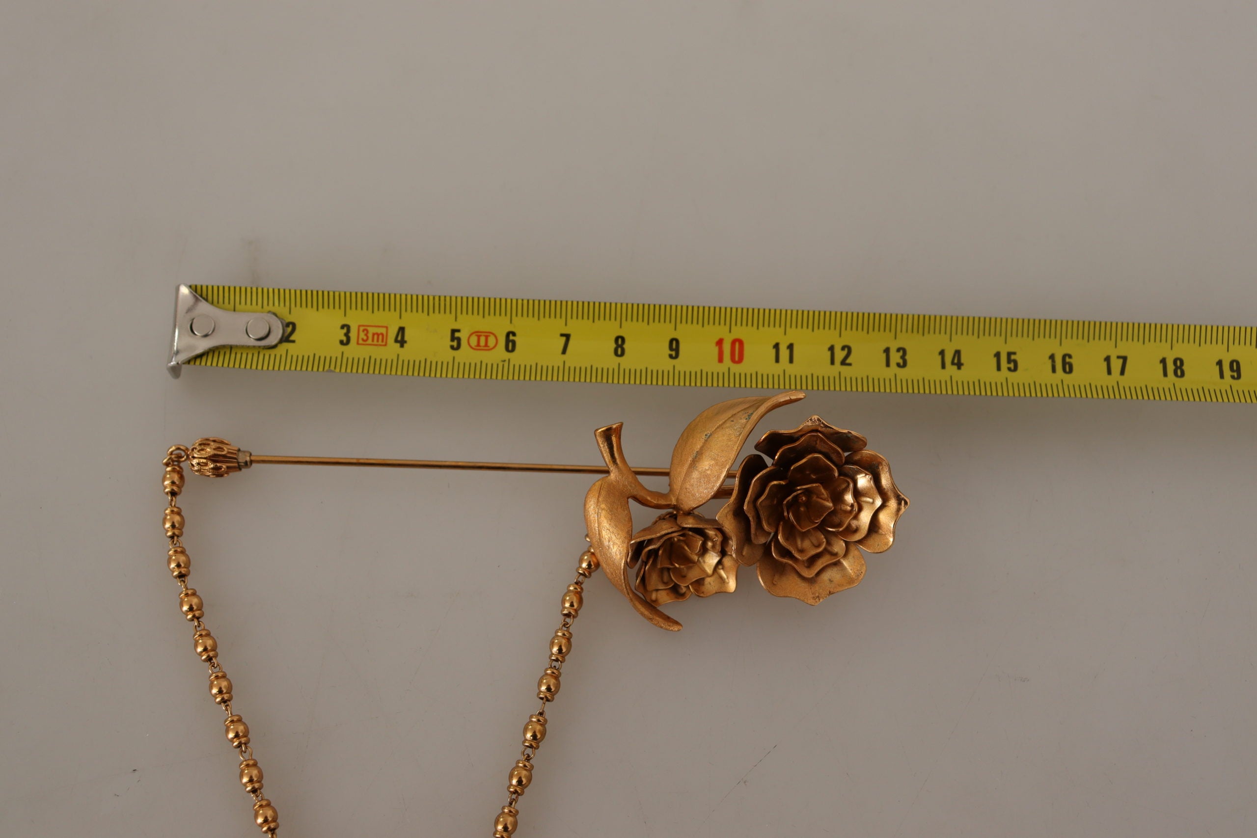 Dolce & Gabbana Elegant Gold Tone Brass Brooch Pin